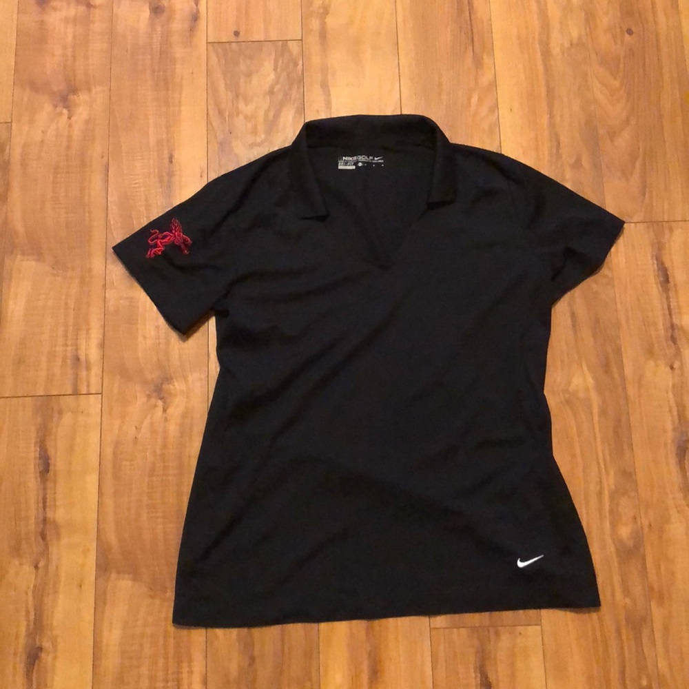 Collar Nike women’s golf shirt. Fireball emblem